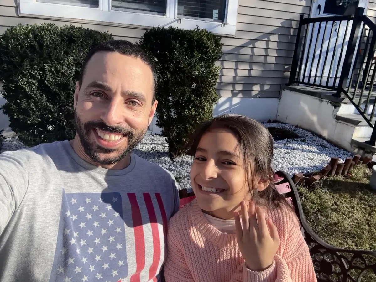 Math Builders founder with his daughter outside
